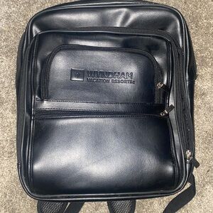New leather shoulder bag for business. Label Wyndham vacation resorts